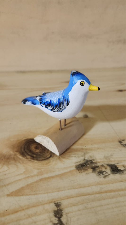 Sculpture d'oiseaux sur bois