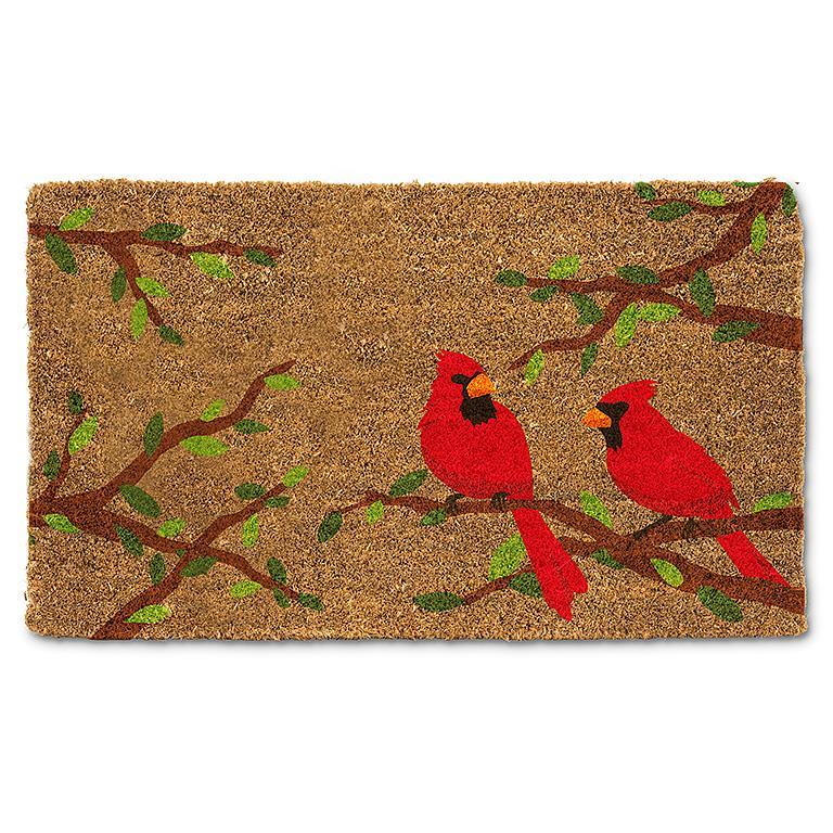 Tapis cardinaux sur branche avec feuilles