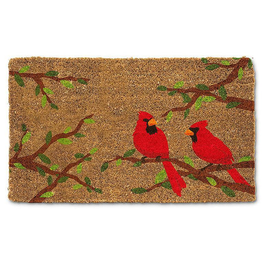 Tapis cardinaux sur branche avec feuilles