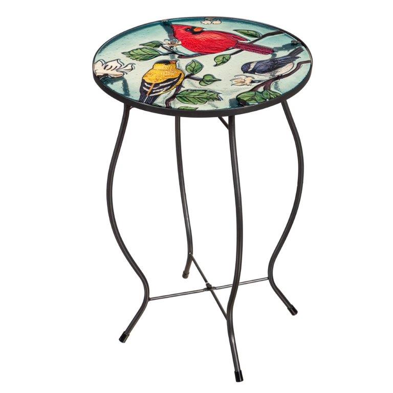 Table en verre avec oiseaux